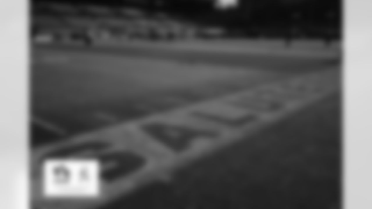A view of Salute to Service signage on the field for the Broncos Week 11 game against the Miami Dolphins on November 22, 2020 at Empower Field at Mile High. Photo by Gabriel Christus