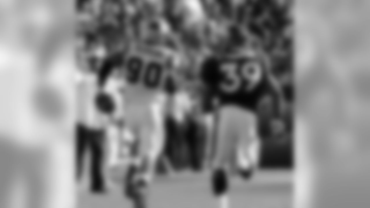 As the Broncos marched down the field in the third quarter to Carolina's 1-yard line, a promising drive turned disastrous when defensive end Julius Peppers picked off a pass intended for Rod Smith and ran 97 yards before being tackled by Smith at the 3-yard line. The Panthers would scored three plays laters on a quarterback sneak touchdown by Jake Delhomme.
