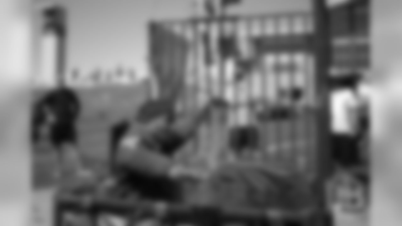 Bradley Chubb is sent to the dunk tank by an accurate throw during the Broncos field day on June 6, 2019.