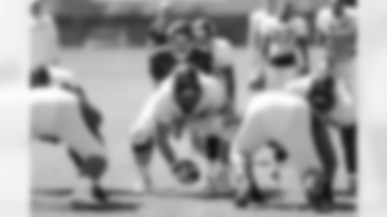 Osweiler takes the snap from Lilja.