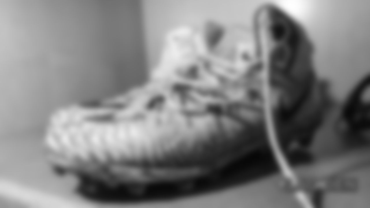 Jared Veldheer's cleats in the locker room before the Broncos' Week 17 game against the Los Angeles Chargers at Broncos Stadium at Mile High on December 30, 2018.