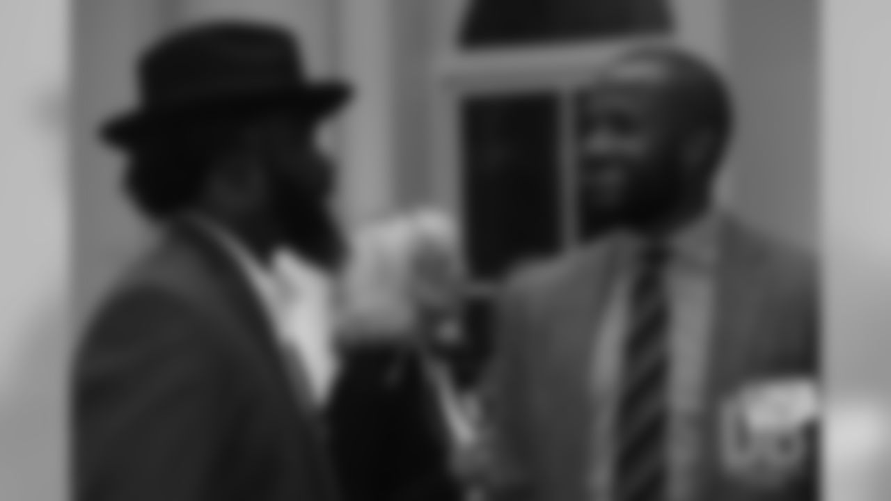 Champ Bailey talks with Ed Reed at the Pro Football Hall of Fame's Celebration of Excellence Reception in Atlanta on January 31, 2019.