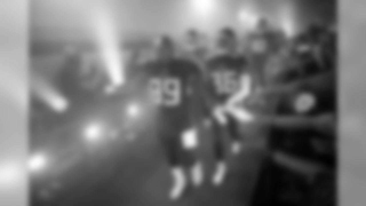 Tennessee Titans defensive lineman Jurrell Casey (99) greets fans as he leads teammates to the field from the locker room prior to an NFL preseason football game against the Pittsburgh Steelers, Sunday, Aug. 25, 2019 in Nashville, Tenn. The Steelers defeated the Titans 18-6. (Joe Robbins via AP)