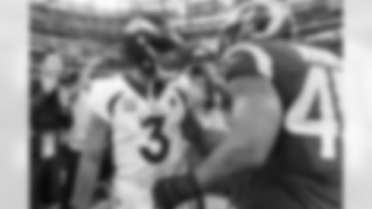 Denver Broncos quarterback Russell Wilson (3) and Los Angeles Rams linebacker Bobby Wagner (45) during an NFL game against the Los Angeles Rams on Sunday, December 25, 2022 at SoFi Stadium in Los Angeles, California.
Photo by Gabriel Christus/Denver Broncos