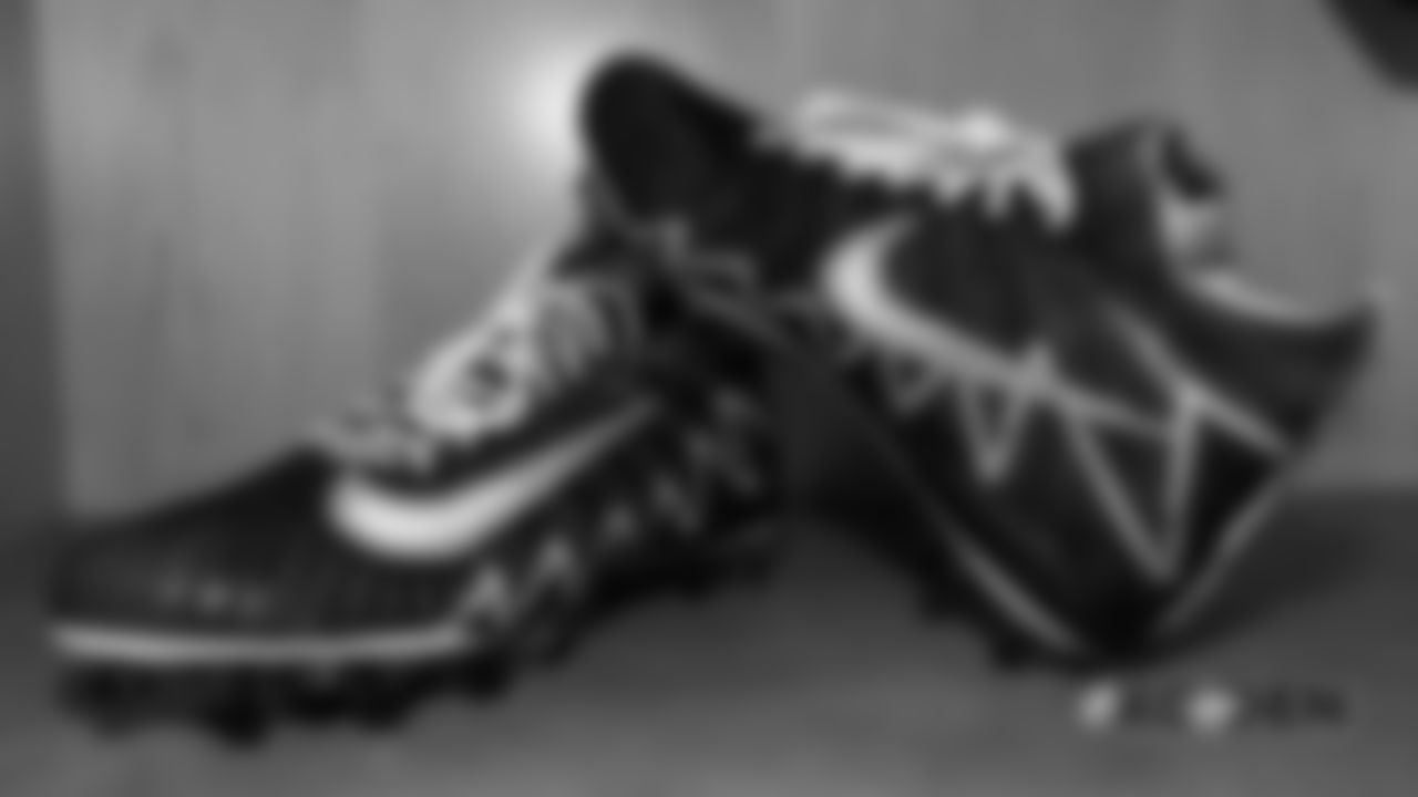 Adam Gotsis' custom cleats in the locker room pregame before the Broncos' Week 4 game against the Kansas City Chiefs at Broncos Stadium at Mile High on October 1, 2018.