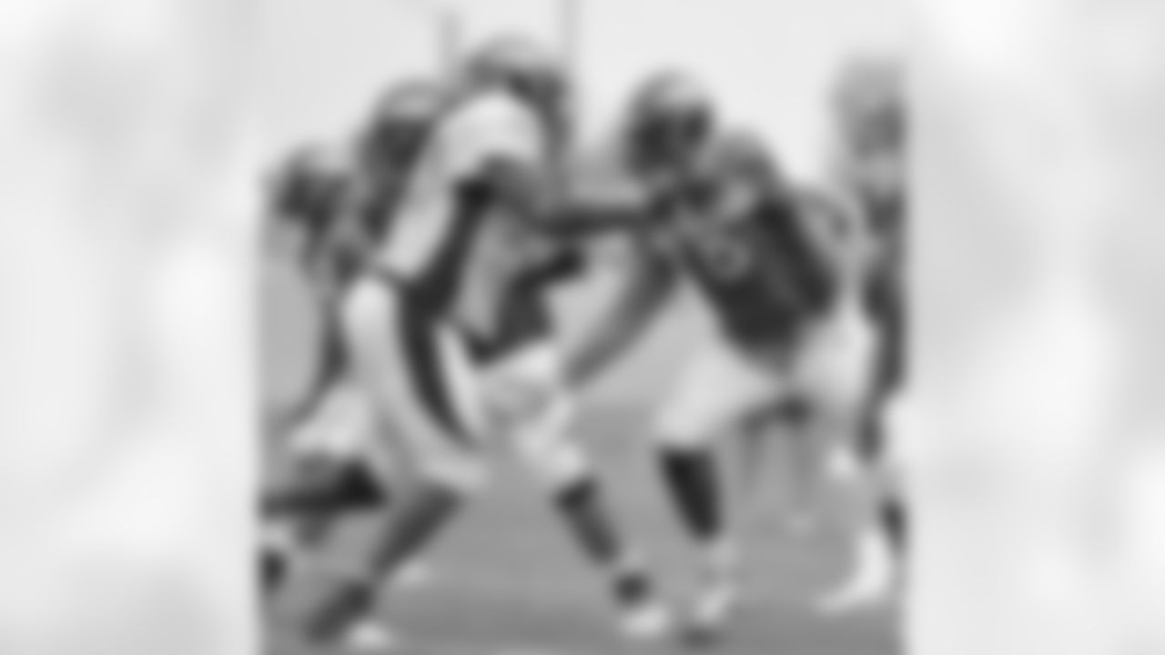 T Ryan Clady blocks during Monday's practice.