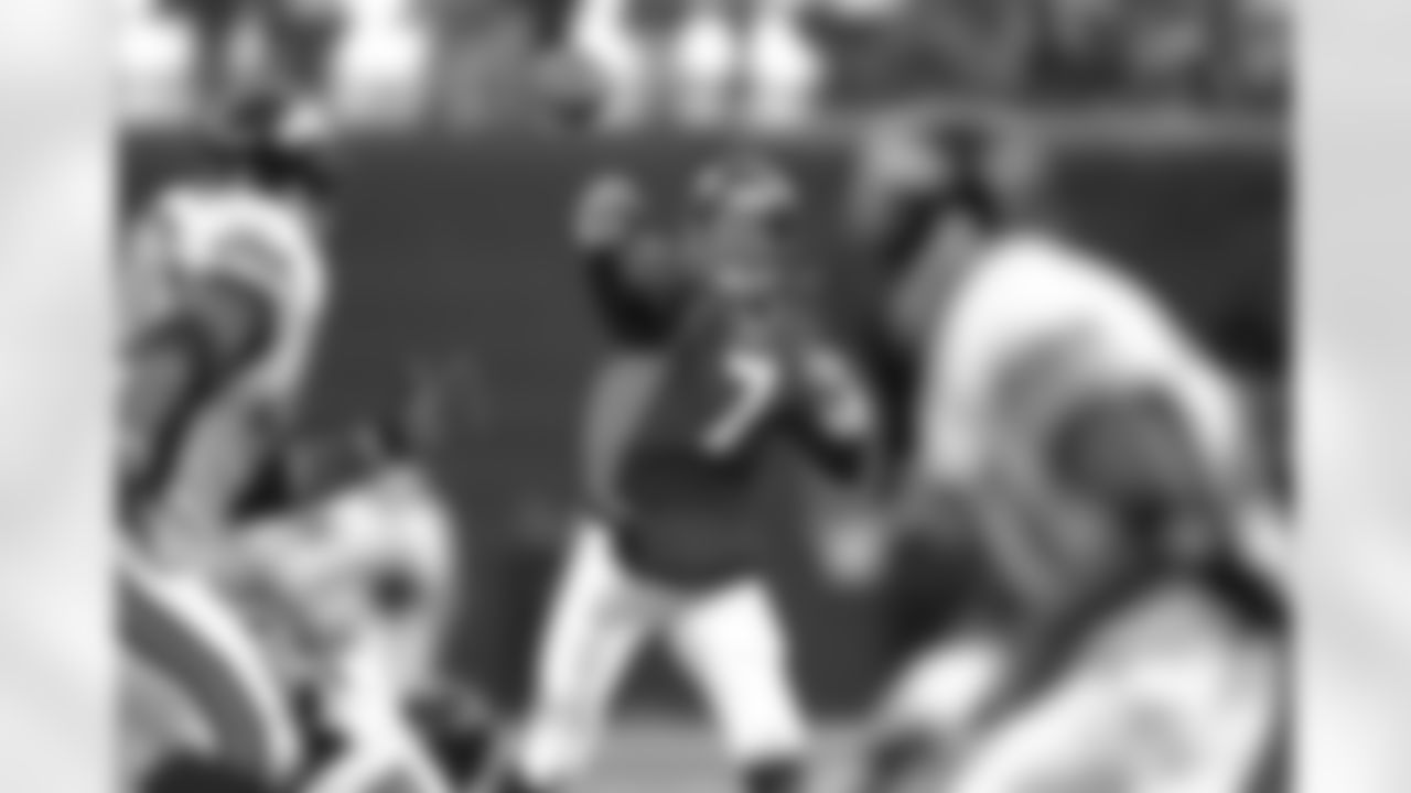 John Elway throws the ball downfield in the 1997 AFC Wild Card Round.