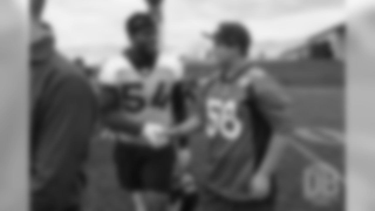 TJ, a 12-year-old fighting cystic fibrosis, wanted to be Von Miller for a day, and the Make-A-Wish Foundation helped make that dream come true on September 29, 2018. Here, TJ meets Brandon Marshall after practice.