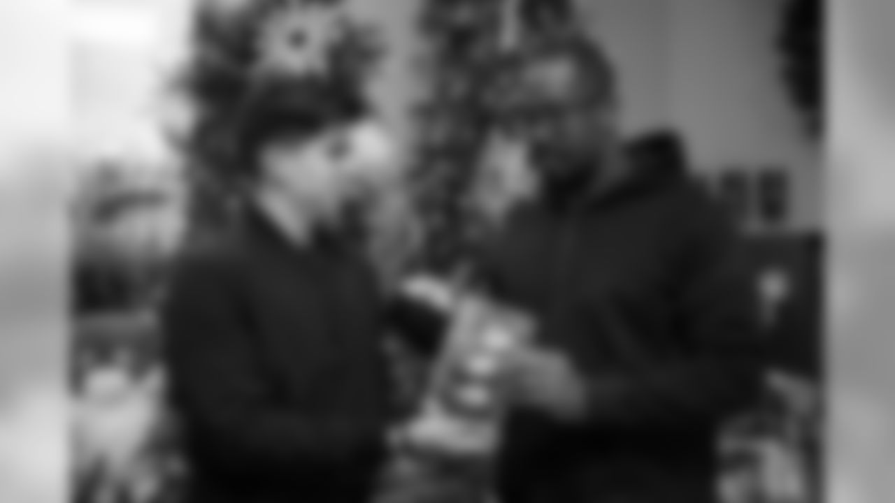 Von Miller takes photos with fans to help encourage donations at a toy drive for Boys & Girls Clubs of Metro Denver for the holidays on December 23, 2019. (Photo by Ben Swanson)