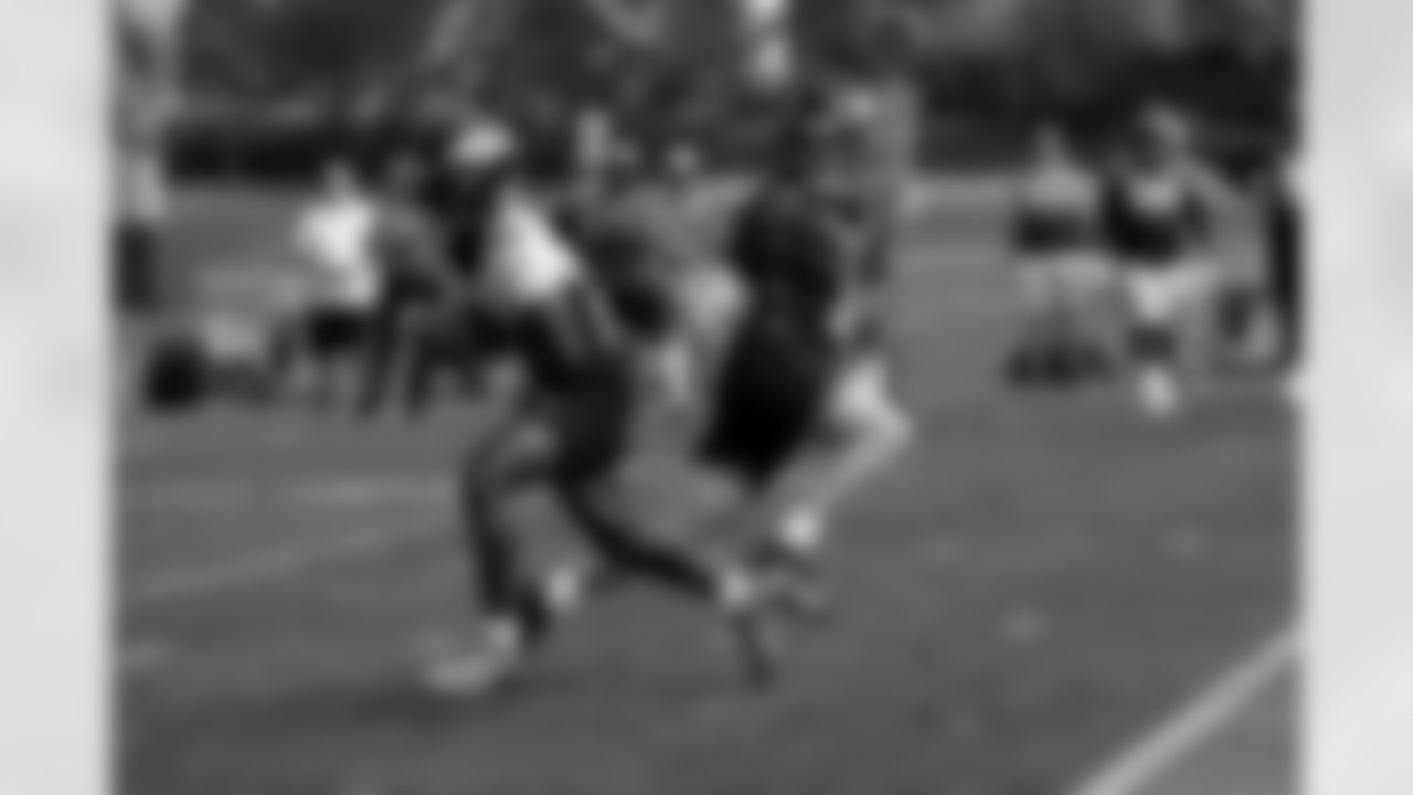 Damarea Crockett and Brett Rypien during practice on the second day of training camp at UCHealth Training Center on July 29, 2021. (Photo by Sam Weaver)
