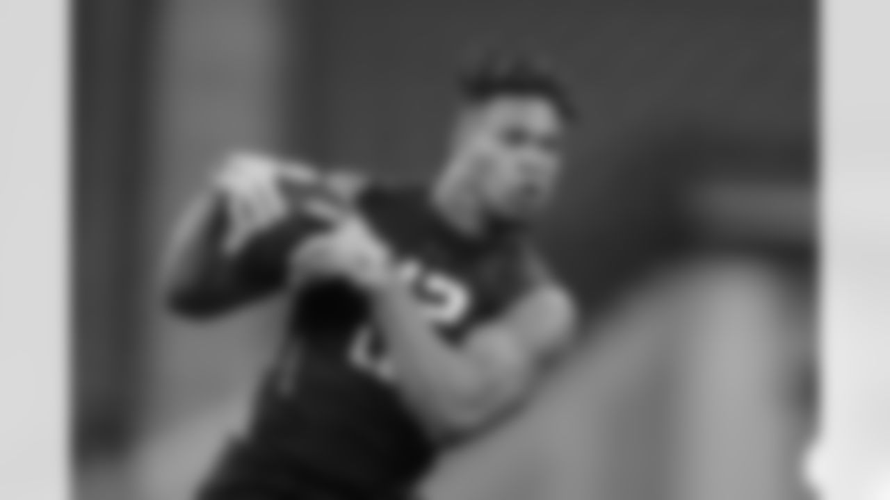 UCLA linebacker Kenny Young runs a drill at the NFL football scouting combine in Indianapolis, Sunday, March 4, 2018. (AP Photo/Michael Conroy)