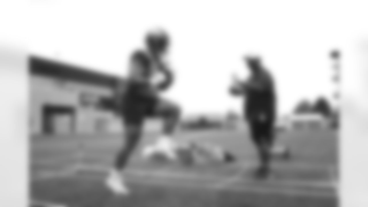 Adam Prentice and Curtis Modkins during practice on Thursday, August 26, 2021 at UCHealth Training Center in Denver, Colorado.
Photo by Gabriel Christus