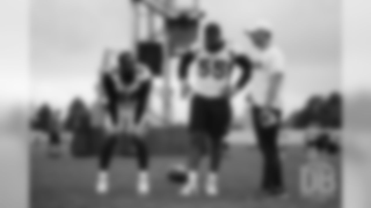 Von Miller and Bradley Chubb with Outside Linebackers Coach Brandon Staley during the first practice of mandatory minicamp on June 4, 2019.