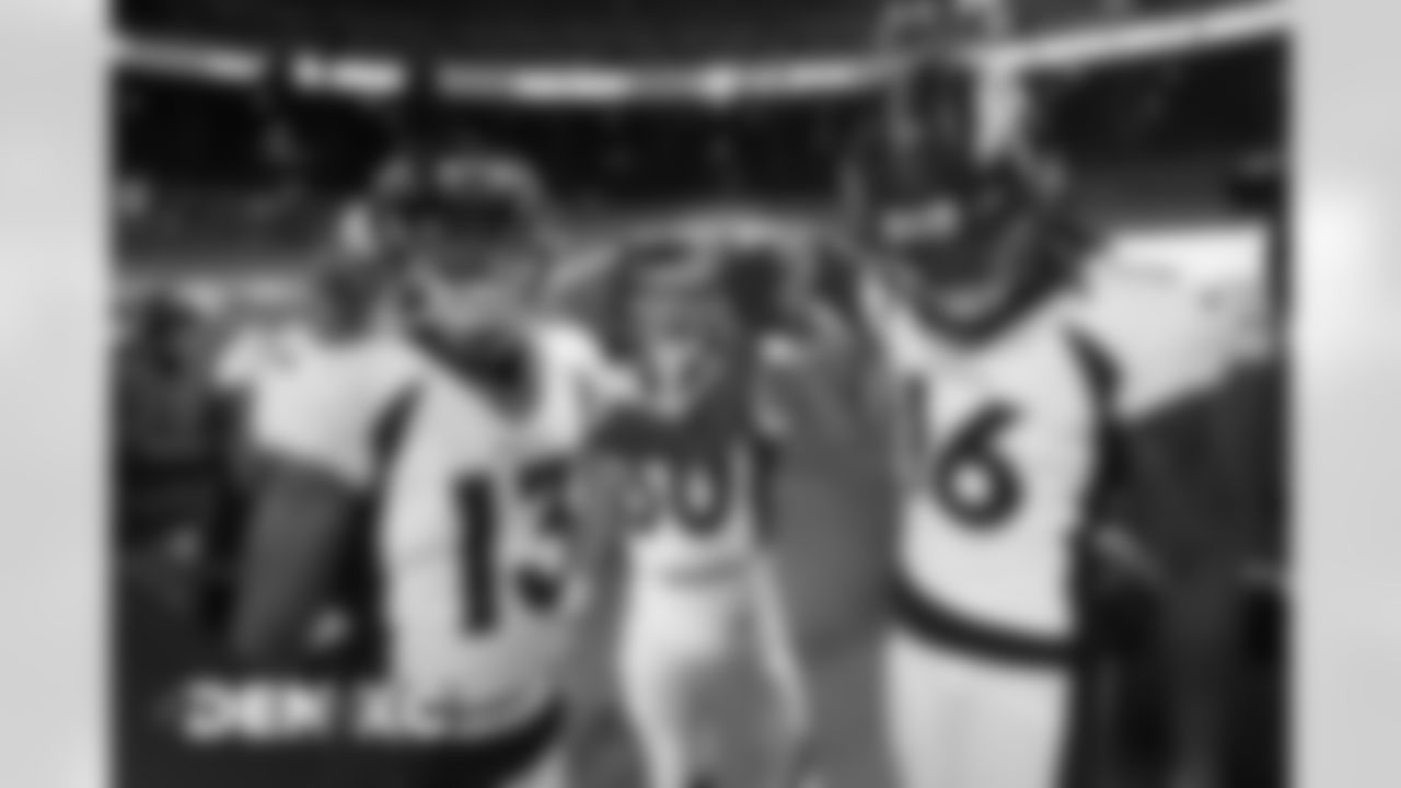KJ Hamler, Phillip Lindsay and Tyrie Cleveland before the Broncos' Week 13 game against the Kansas City Chiefs at Arrowhead Stadium in Kansas City, Missouri. (Photo by Gabriel Christus)