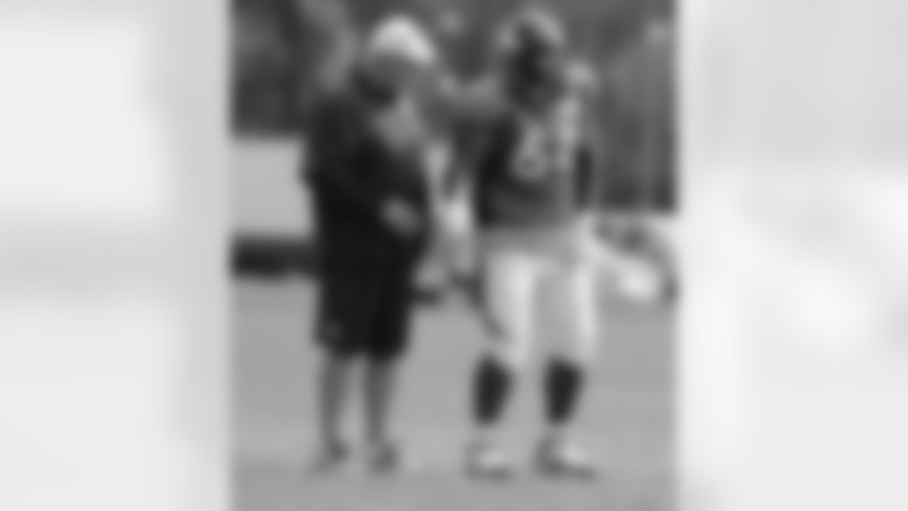 OL Philip Blake talks to OL Coach Dave Magazu.