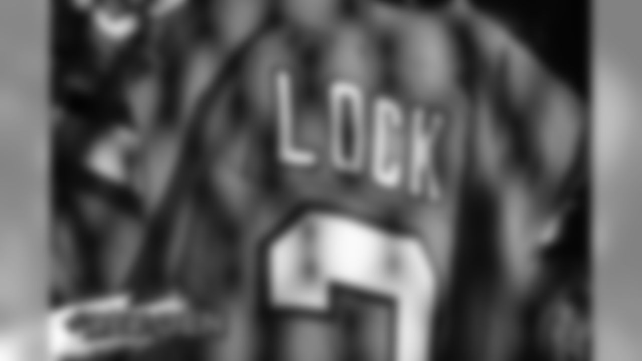 A preview of Drew Lock's Color Rush jersey during a photoshoot ahead of the team's Week 16 game against the Lions on December 18, 2019 at UCHealth Training Center. (Photo by Ben Swanson)