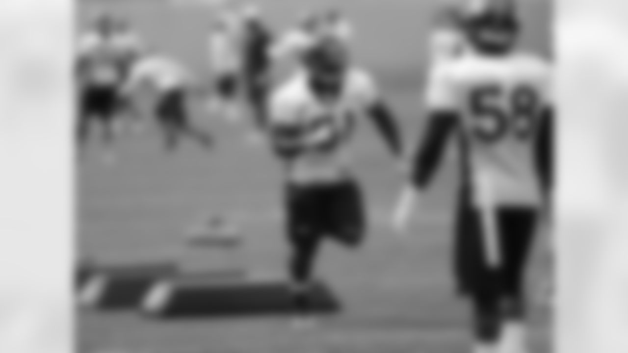 LB Joe Mays finishes a drill.