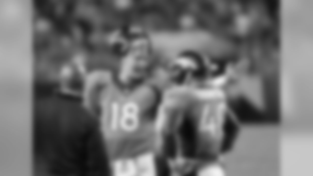 QB Peyton Manning and RB Juwan Thompson