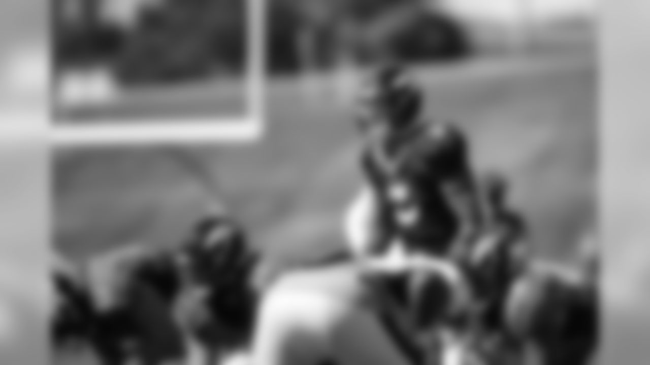 Drew Lock steps up behind center for a snap during the fourth training camp practice at UCHealth Training Center on August 16, 2020. (Photo by Ben Swanson)