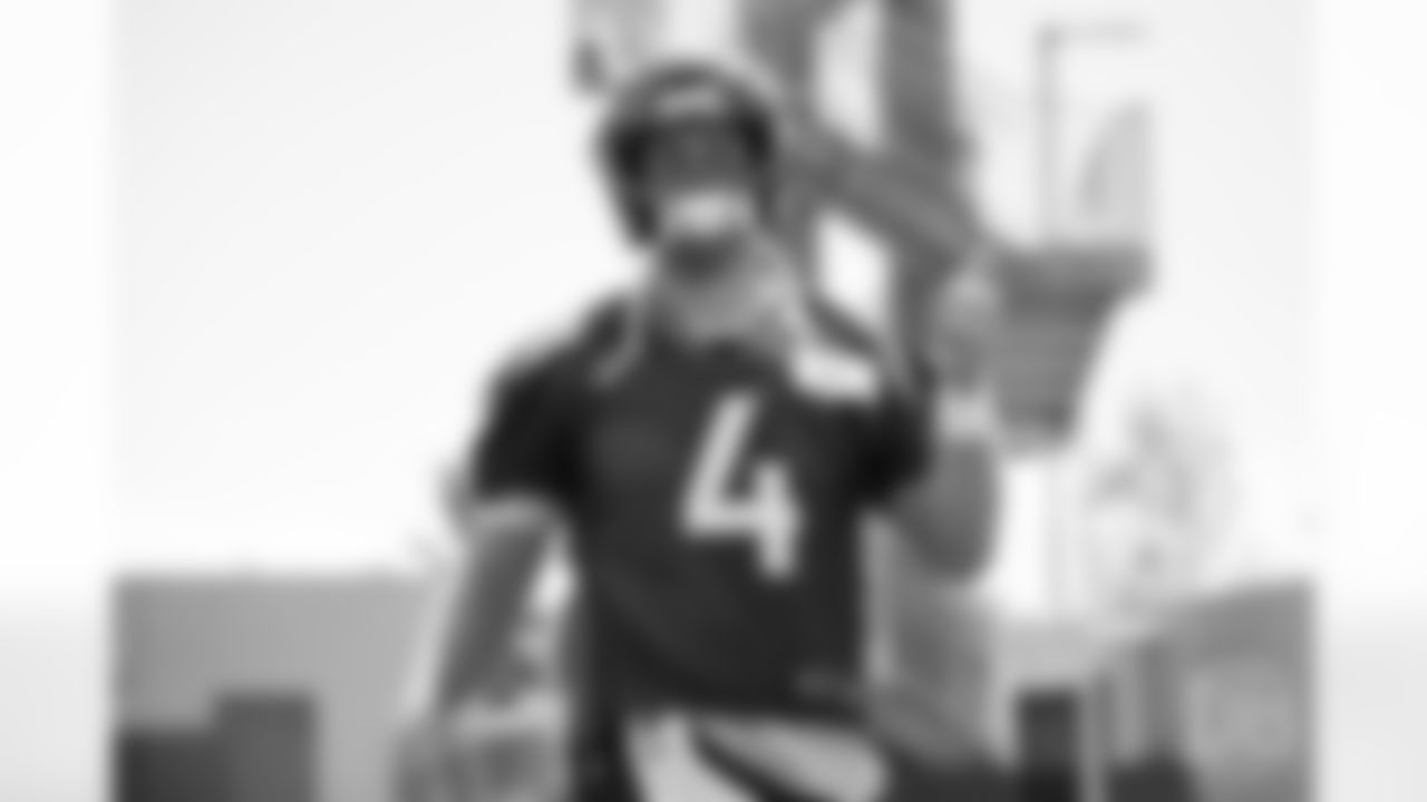 quarterback Case Keenum (4) gives a thumbs up during the 10th and final day of OTAs on June 7, 2018 at UCHealth Training Center.