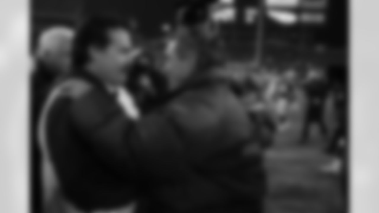 Mike Shanahan greets Jeff Fisher after the Broncos victory over the Titansduring the NFL game against the Tennessee Titans on December 25, 2004 at The Coliseum in Nashville, Tennessee.