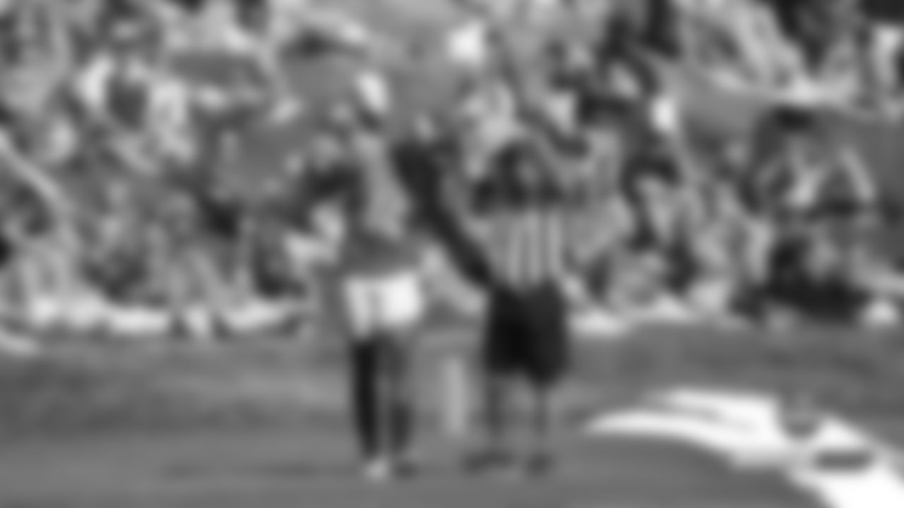 Courtland Sutton thanks the ref after a touchdown ruling during practice on Day 17 of training camp on August 13, 2019.