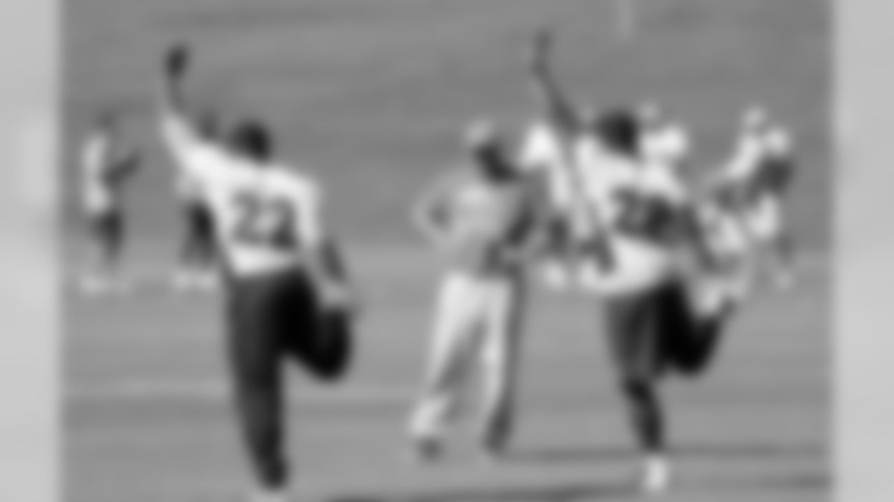 RBs C.J. Anderson and Montee Ball, and Strength/Cond. Coach Luke Richesson