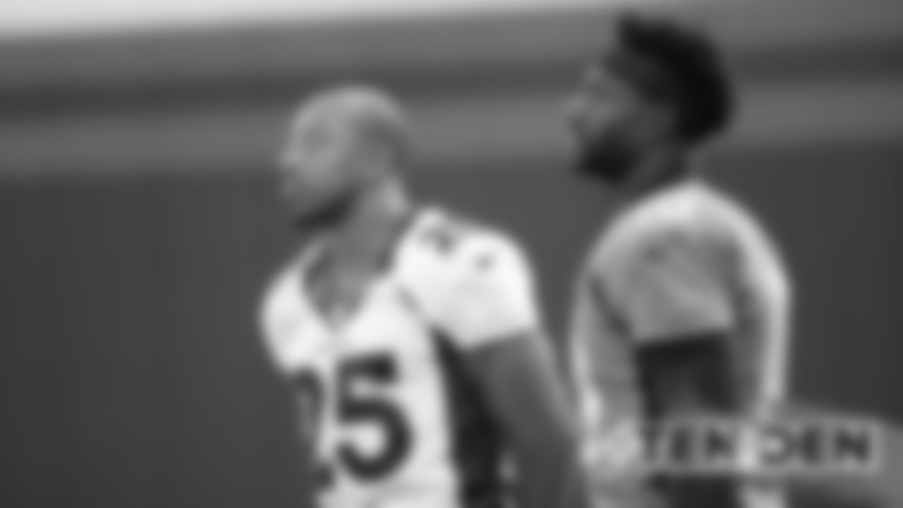 Chris Harris Jr. and Emmanuel Sanders at practice on October 11, 2019 at UCHealth Training Center. (Photo by Ben Swanson)