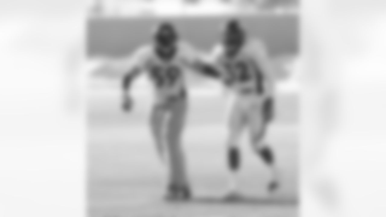 Danny Trevathan and Wesley Woodyard