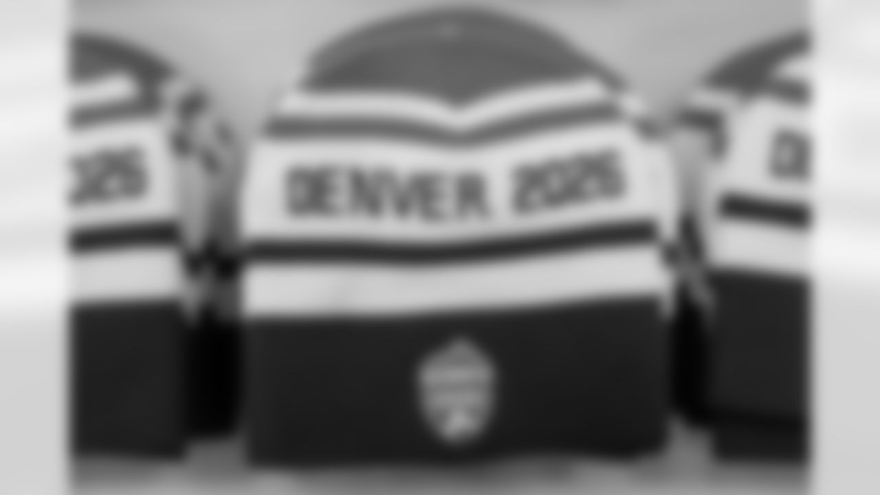 Hats to promote Denver's World Cup bid to be a host city at Empower Field at Mile High in Denver, Colorado on October 25, 2021. (Photo by Ben Swanson)
