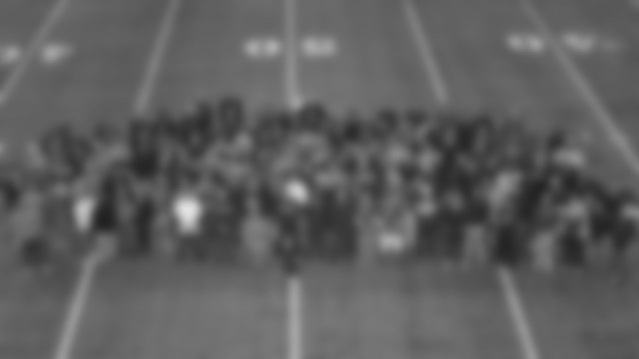 A group photo of Vic Fangio and members of his coaching staff with high school coaches at the ninth annual High School Football Coaches Clinic hosted by the Broncos for 190 coaches from 54 different schools on May 8, 2019.