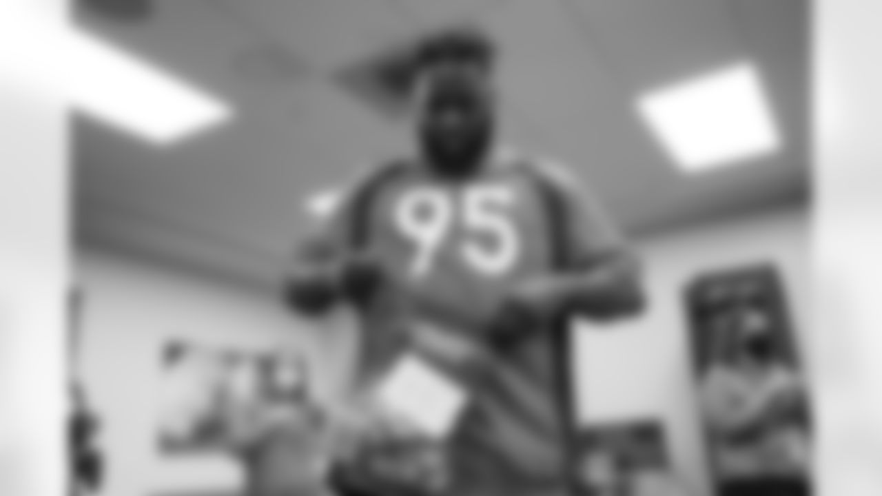 In recognition of Domestic Violence Awareness Month, Broncos players McTelvin Agim, Javon Patterson, Tyrie Cleveland, Tim Patrick, De'Mornay Pierson-El and Malik Reed wrote notes to and assembled 200 care packages for survivors of domestic violence.