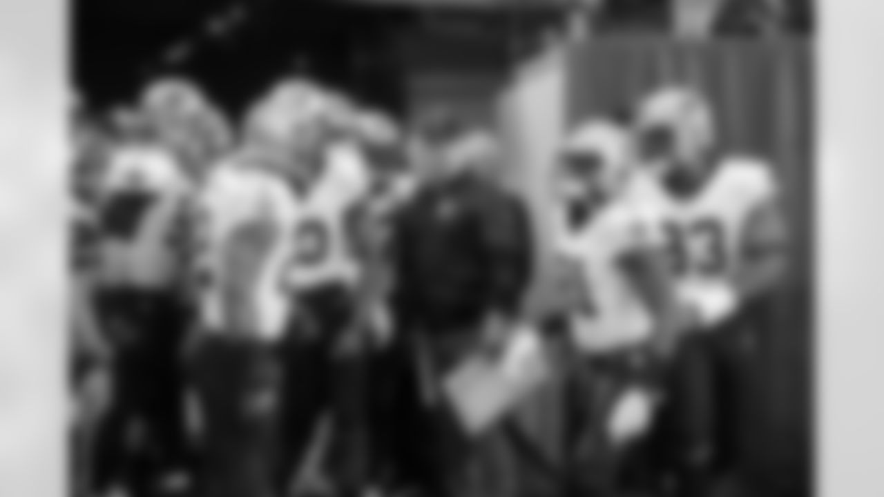 New Orleans Saints head coach Sean Payton stands in the tunnel with players prior to taking the field against the Minnesota Vikings during a NFC Divisional playoff football game on Sunday, Jan. 14 in Minneapolis. The Vikings defeated the Saints 27-23. (G. Newman Lowrance via AP)