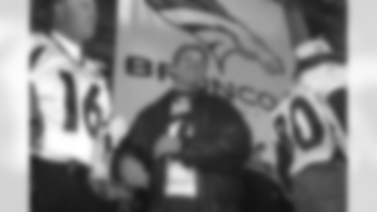 An estimated 350,000 fans turned out in downtown Denver and then on to City Hall to catch a glimpse of their back-to-back World Champion Broncos. Here, John Elway is pictured on stage with the team.