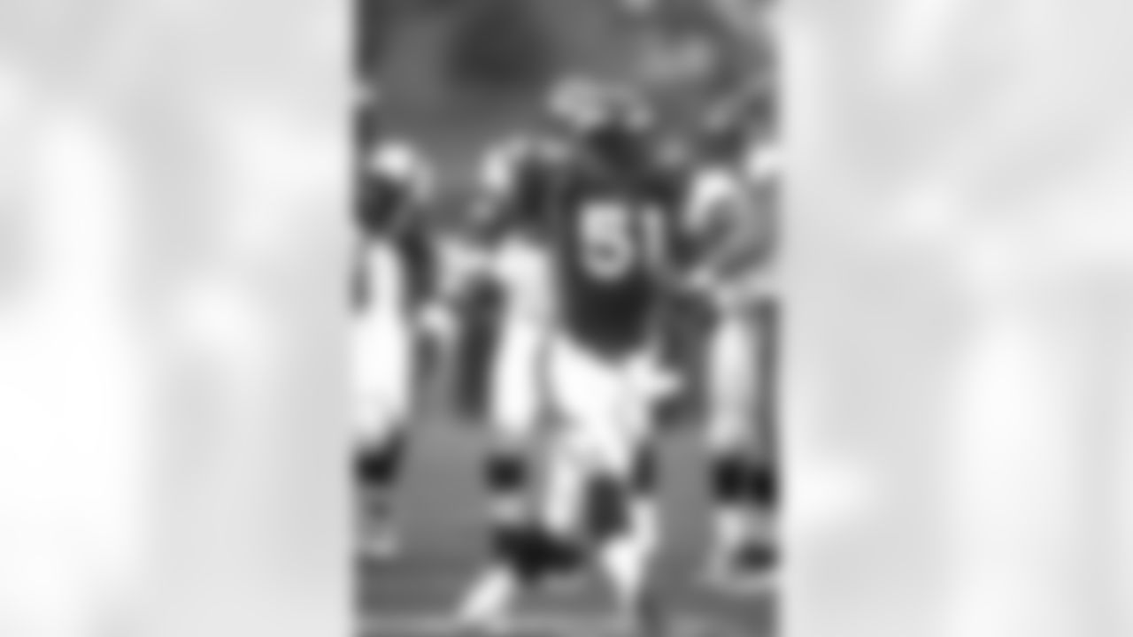 John Mobley celebrates after making a defensive play against the Cincinnati Bengals at Mile High Stadium in Denver, CO on September 21, 1997.
