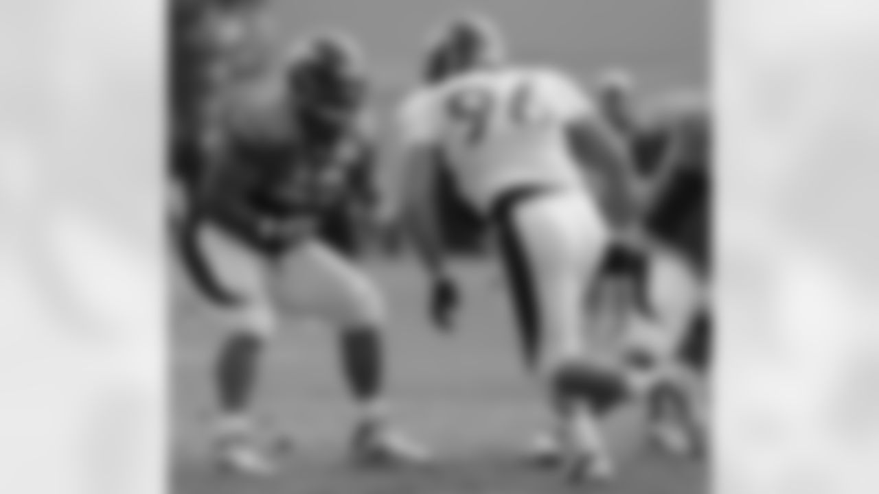 OL Manny Ramirez gets set to block DT Mitch Unrein.