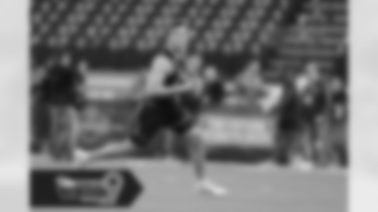 Missouri quarterback Drew Lock runs a drill during the NFL football scouting combine, Saturday, March 2, 2019, in Indianapolis. (AP Photo/Darron Cummings)