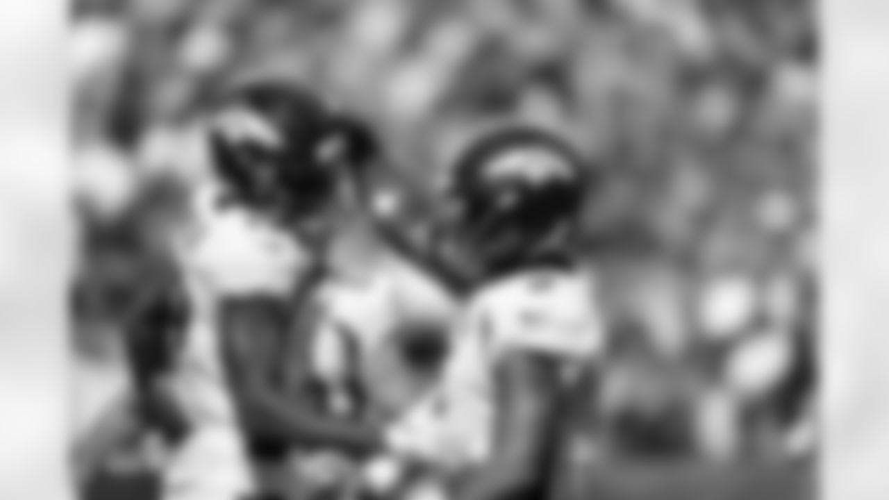 Marvin Mims Jr. (19) and Russell Wilson (3) during the Broncos' Week 2 game against the Washington Commanders at Empower Field at Mile High in Denver, Colorado on September 17, 2023. Photo by Gabriel Christus / Denver Broncos
