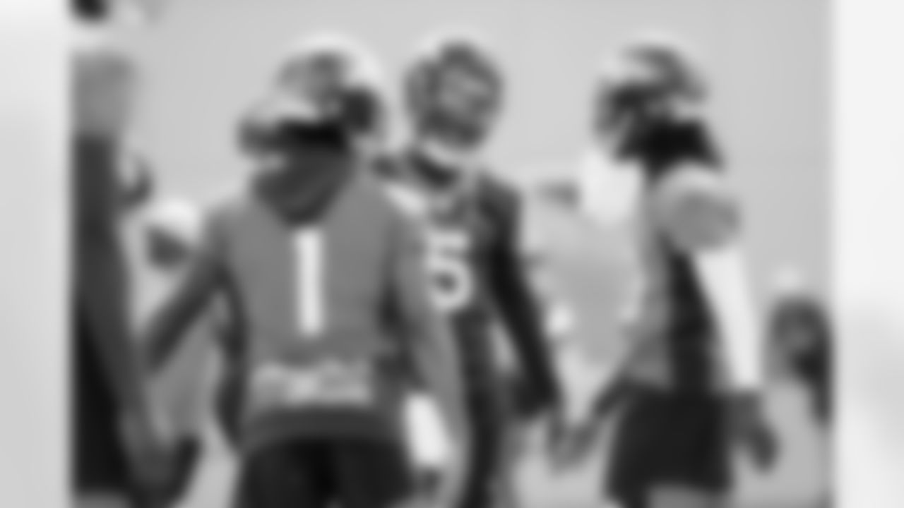Teddy Bridgewater shares a laugh with Jerry Jeudy and KJ Hamler during the 10th day of OTA practices at UCHealth Training Center on June 10, 2021. (Photo by Ben Swanson)