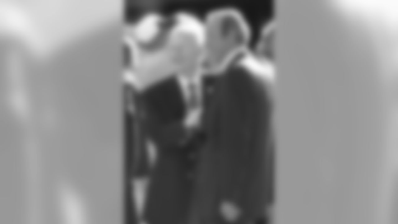 Broncos owner Pat Bowlen chats with Chiefs owner Lamar Hunt against the Kansas City Chiefs at Invesco Field at Mile High in Denver, CO on December 7, 2003.