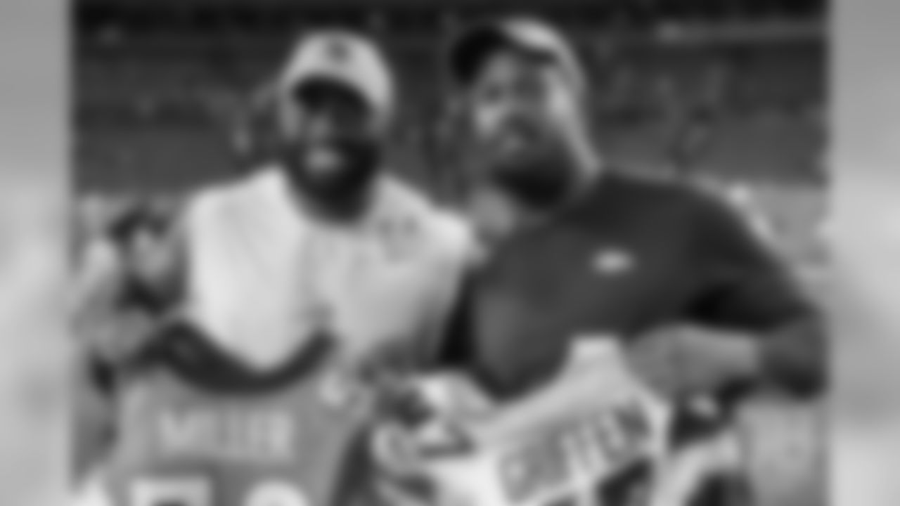 Viking Everson Griffen and outside linebacker Von Miller (58) swap jerseys after action against the Minnesota Vikings during the NFL game at Broncos Stadium in Denver Colo. August 11, 2018.