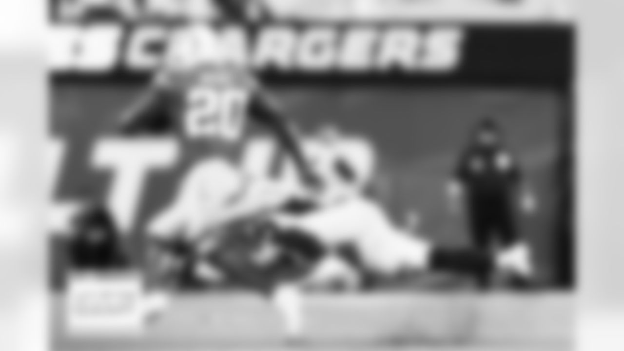 Denver Broncos linebacker Alex Singleton (49) tackles Los Angeles Chargers running back Sony Michel (20) during the NFL game against the Los Angeles Chargers on Monday, October 17, 2022 at SoFi Stadium in Los Angeles, California.
Photo by Gabriel Christus / Denver Broncos