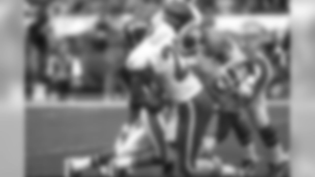 Safety Tyrone Braxton forces a fumble during a Sept. 1, 1996 win (31-6) over the New York Jets.