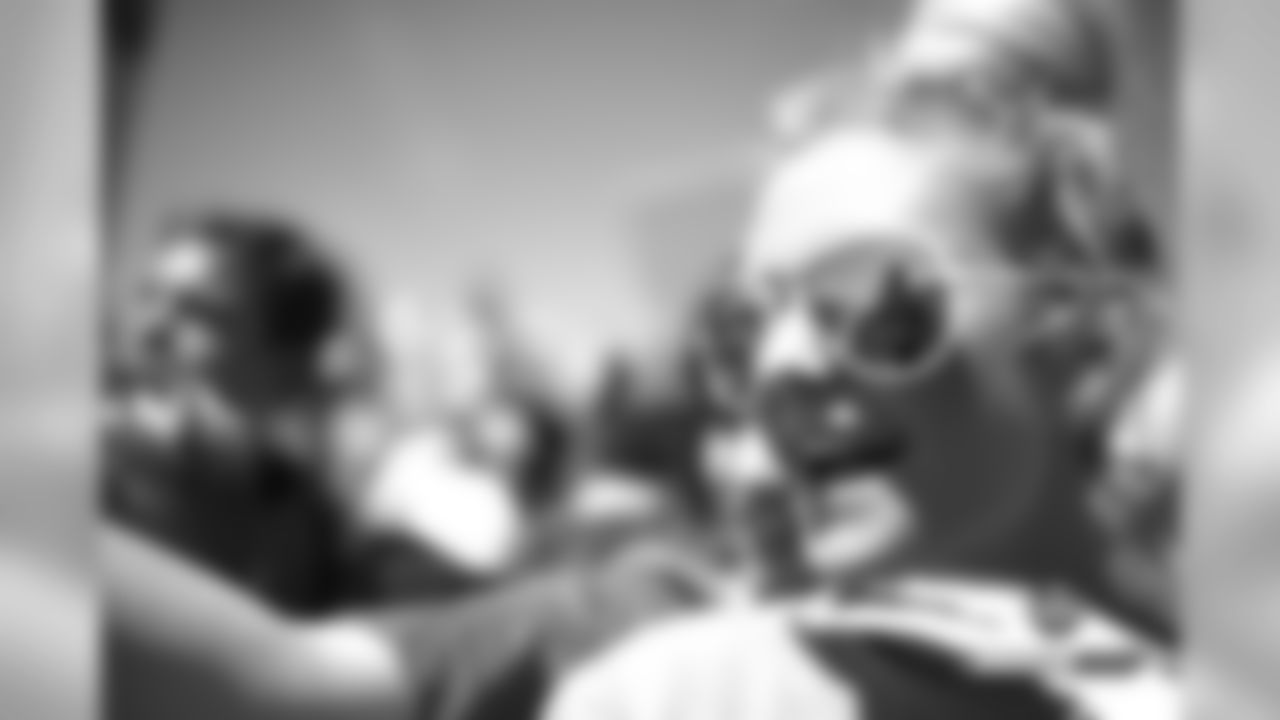 Von Miller signs autographs in the reflection of a fan's sunglasses at UCHealth Training Center in Englewood, Colorado, August 06, 2019.
Photo by Gabriel Christus