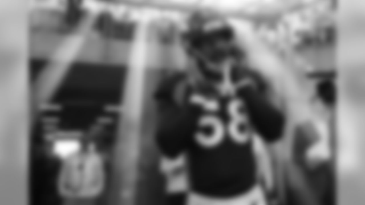 Von Miller in the tunnel during player introductions before the Broncos' game against the Tennessee Titans at Empower Field at Mile High on October 13, 2019. (Photo by Ben Swanson)