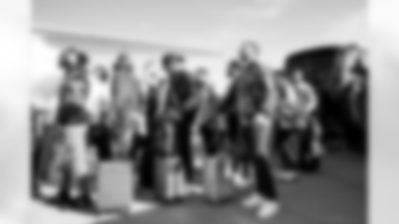 Brandon McManus on the tarmac at Denver International Airport on October 16, 2022 during the team's travel to Los Angeles for a Week 6 game against the Chargers. (Photo by Ben Swanson)