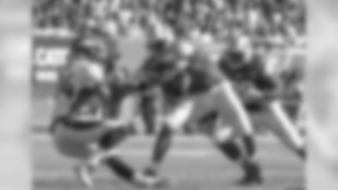 DeMarcus Ware and Geno Smith