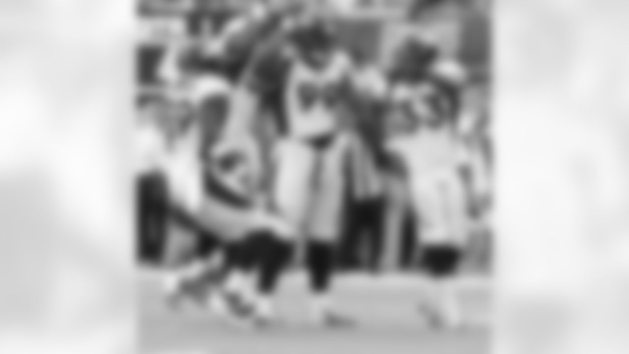 Kevin Vickerson celebrates a tackle for loss