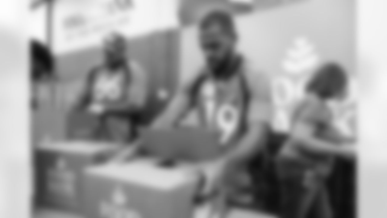 Darrius Shepherd during a volunteer packaging event at Food Bank of the Rockies' warehouse in Denver, Colorado on September 7, 2022. (Photo by Ben Swanson)