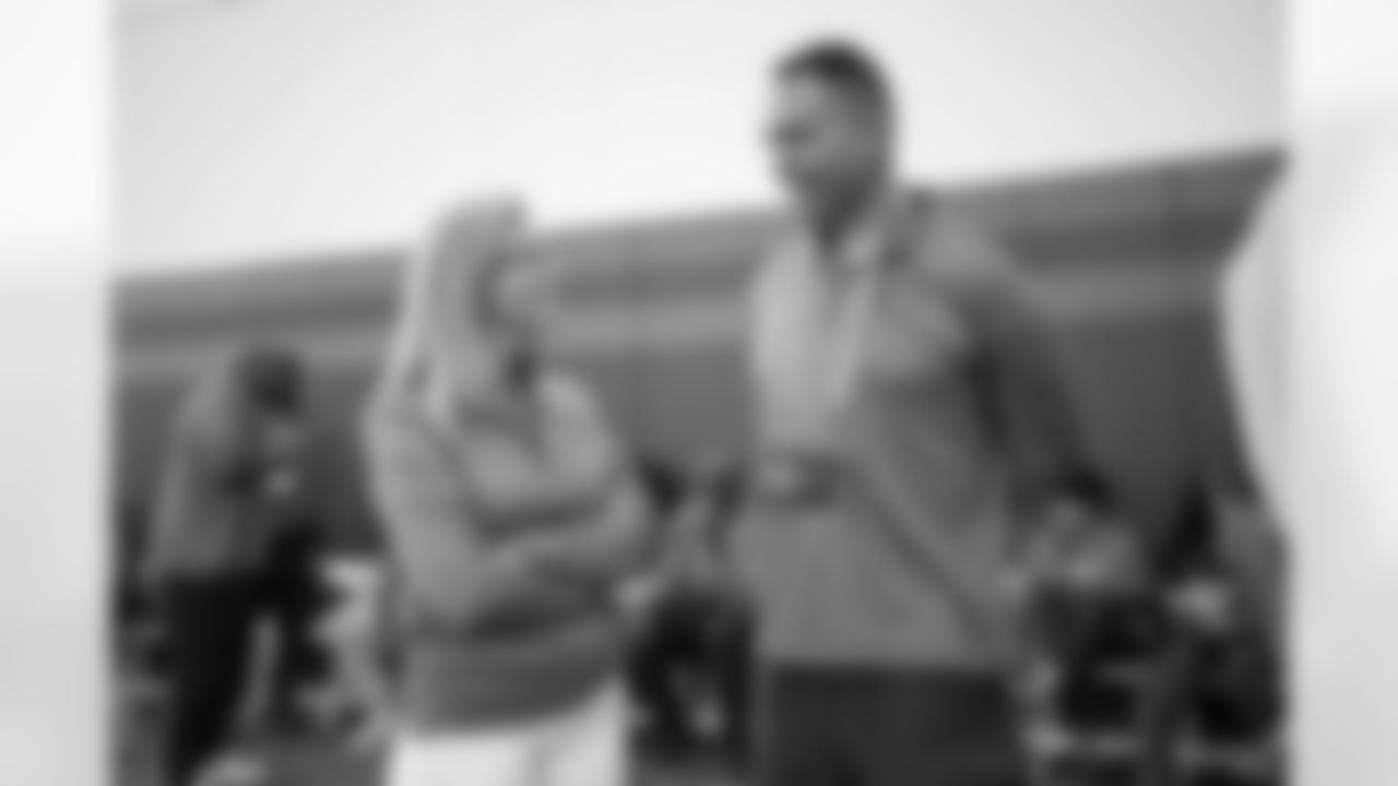 Dennis Smith and Carrie Walton Penner during an alumni breakfast and practice at Centura Health Training Center in Englewood, Colorado on September 16, 2023. Photo by Ben Swanson / Denver Broncos